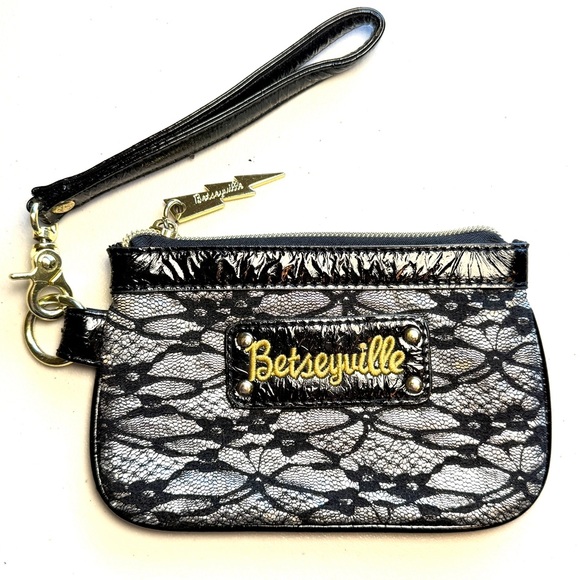 Betsey Johnson Handbags - Betsey Johnson Black Gold Patent Lace with Stud Detail Zip Wristlet Betseyville